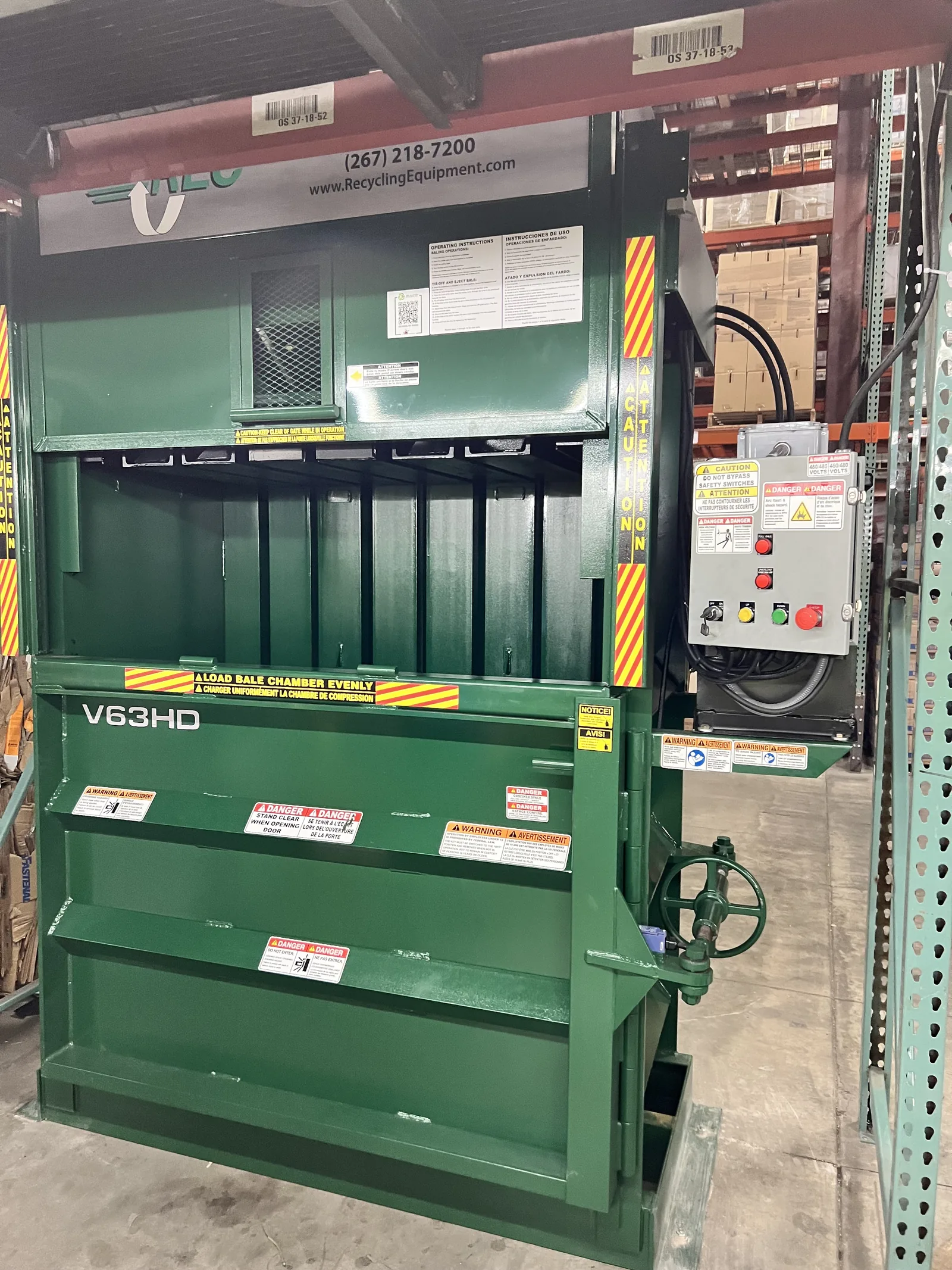 A new green vertical baler ready for installation