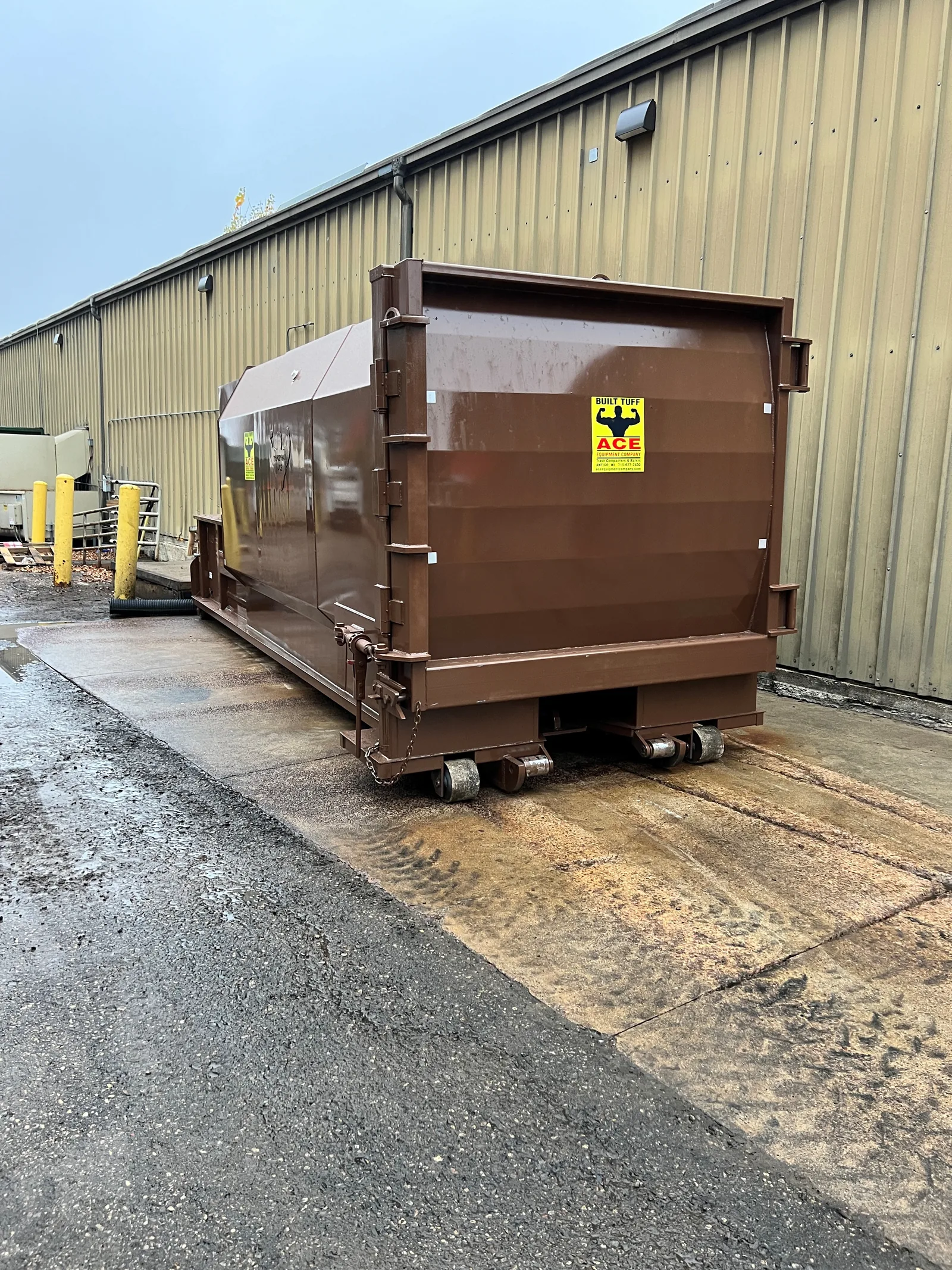 A brown container at a loading bay