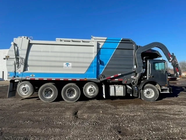 Refuse collection trucks in the MCS Midwest yard